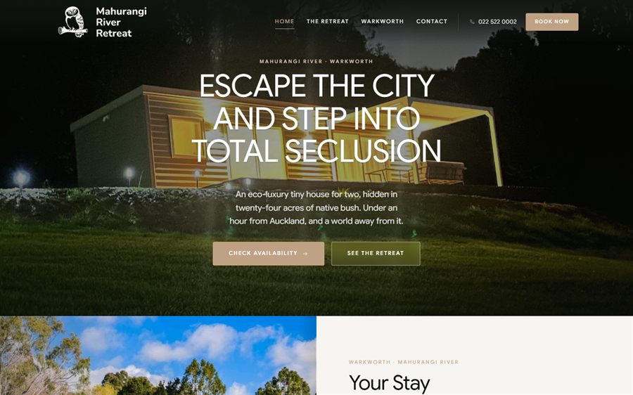 The Mahurangi River Retreat website: a tiny house lit at dusk under the words Escape the city and step into total seclusion